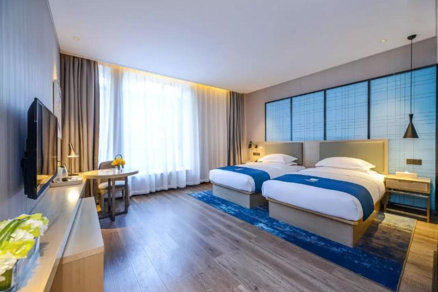 Echarm Hotel Ji'Nan Railway Station Jinan Luaran gambar